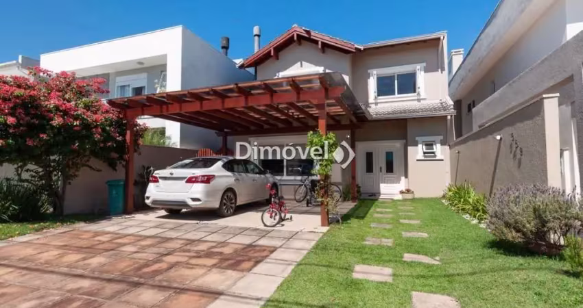 Casa em condomínio fechado com 3 quartos para alugar na Avenida Juca Batista, 8000, Belém Novo, Porto Alegre