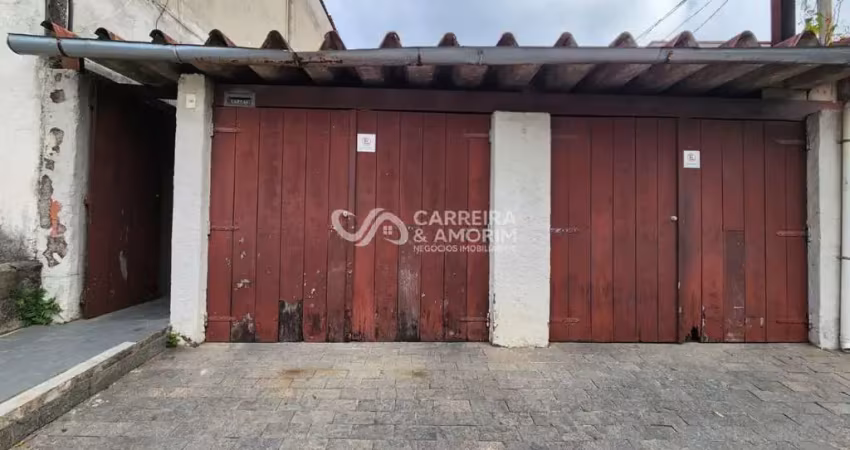 Imóvel à venda no jardim germânia: terreno de 236m² com 3 casas, 2 vagas cobertas e quintal espaçoso. ideal para moradia ou investimento