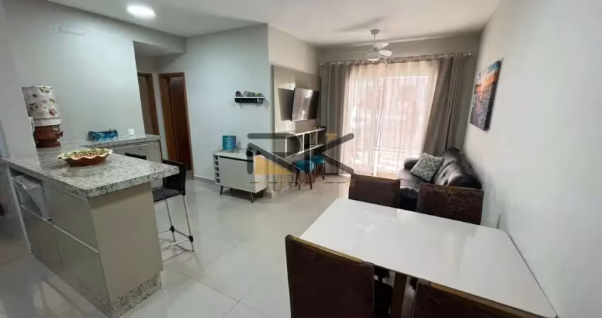 Apartamento nas toninhas com 2 dormitórios sendo 1 suíte,2 vagas de garagem,varanda gourmet com churrasqueira,sala 2 ambientes