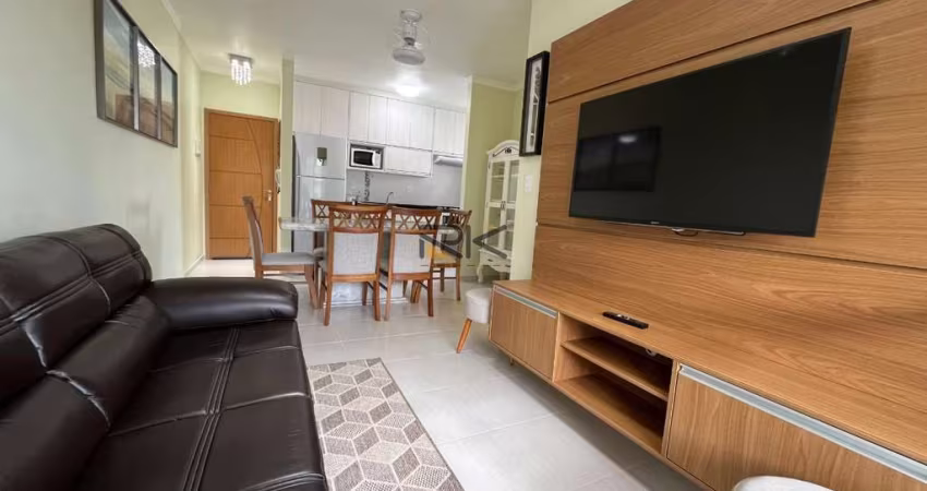 APARTAMENTO NA PRAIA GRANDE com 2 dormitórios sendo 1 suíte,1 vaga de garagem,varanda gourmet com churrasqueira,sala 2 ambientes