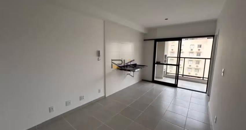 Apartamento nas toninhas com 1 suíte,sala 2 ambientes,varanda gourmet com churrasqueira