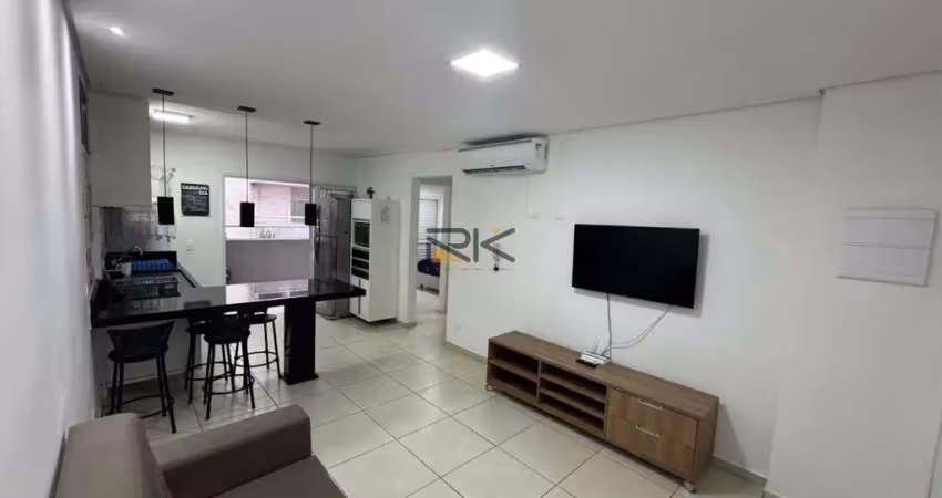 Apartamento com sala de estar e jantar,varanda gourmet com churrasqueira