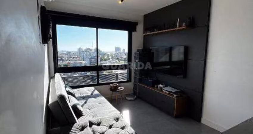 Apartamento totalmente mobiliado com 1 dormitório e 1 vaga no bairro Menino Deus