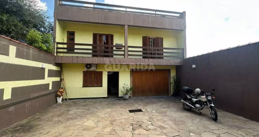 Casa residencial com 4 dormitórios no bairro Cristo Redentor.