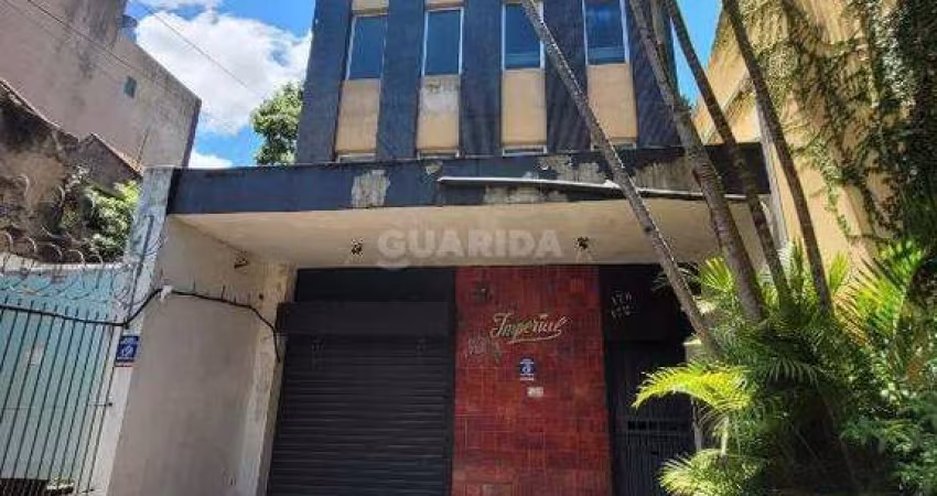 Prédio com 3 pavimentos, loja na parte térrea, e 2 vagas de garagem no bairro Santana