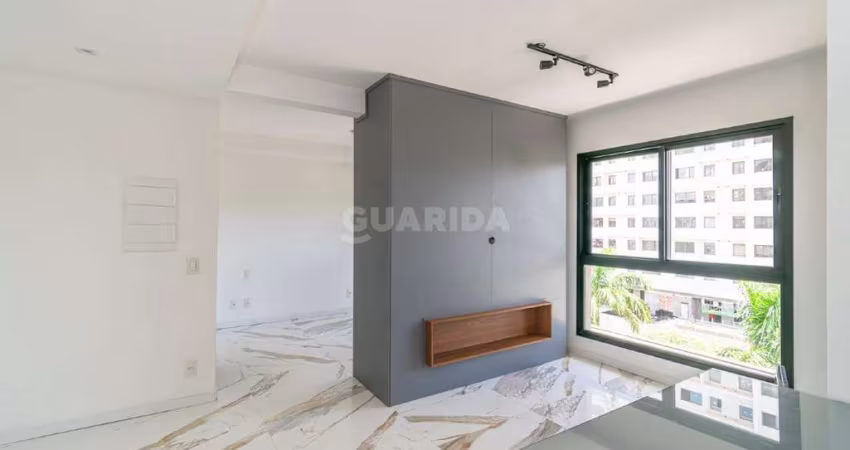 Apartamento semimobiliado com 1 dormitório e 1 vaga de garagem no bairro Central Park
