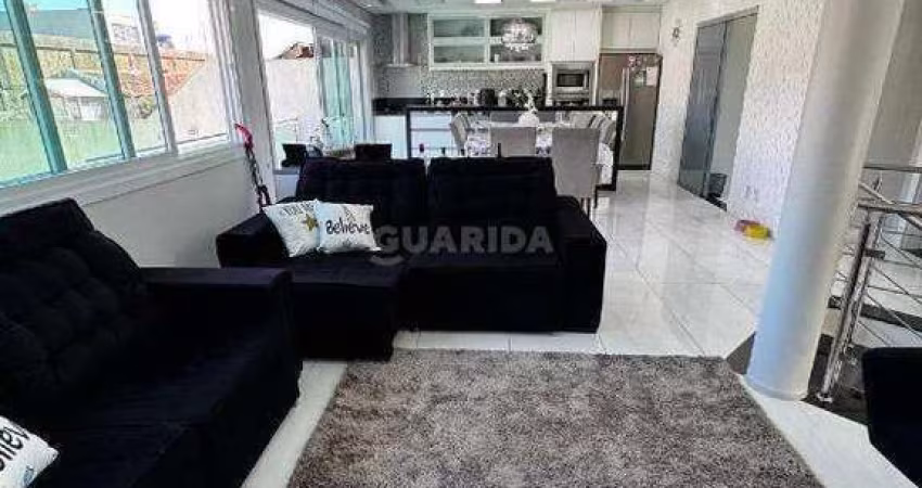 Casa Residencial com 3 dormitórios, sendo 1 suíte, e 5 vagas de garagem no bairro Jardim Leopoldina