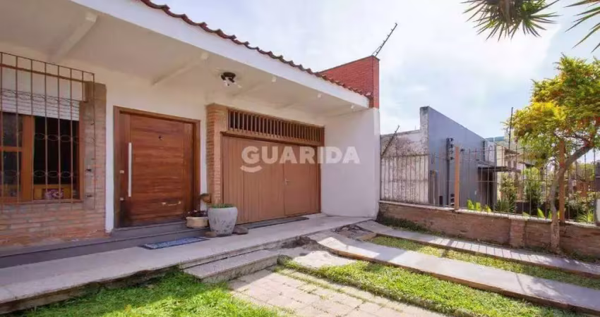 Casa residencial com 3 dormitórios e 2 vagas de garagem no bairro jardim botânico