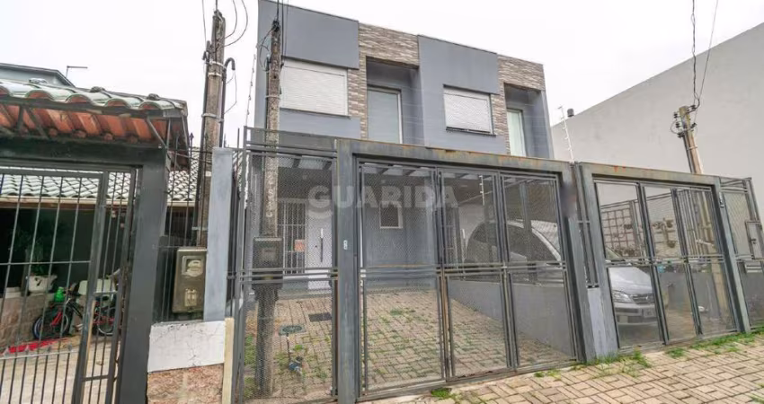 Casa residencial de 3 dormitórios no bairro Ipanema