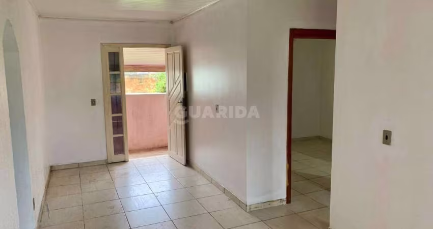 Casa residencial de 2 dormitórios, sendo 1 suíte, no bairro Jardim Leopoldina.