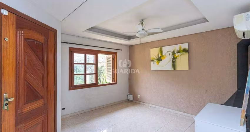 Casa residencial com 3 dormitórios e 3 vagas de garagem, no bairro Agronomia.