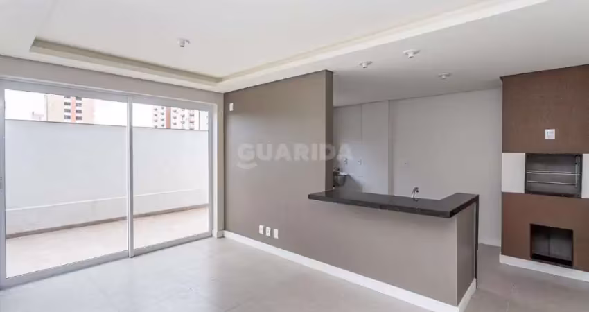 Apartamento com 1 dormitório e 1 vaga de garagem, no bairro Partenon
