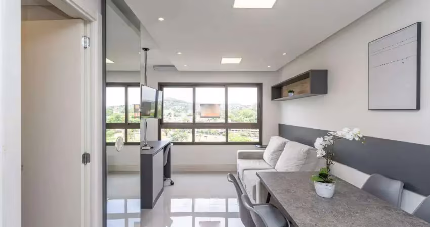 Apartamento estilo loft mobiliado com 1 vaga de garagem no bairro jardim botânico