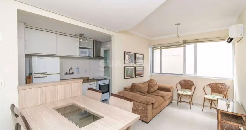 Apartamento mobiliado, de 1 dormitório, vaga coberta e churrasqueira no bairro rio branco!