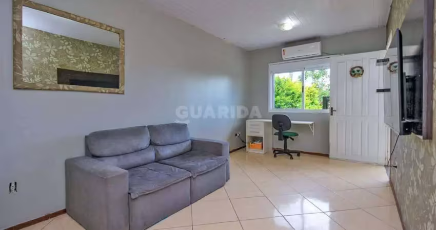 Casa mobiliada com 2 dormitórios e 1 vaga de garagem no bairro hípica