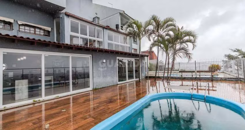 Casa em condomínio fechado com 3 quartos para alugar na Rua Alcebíades Antônio dos Santos, Nonoai, Porto Alegre