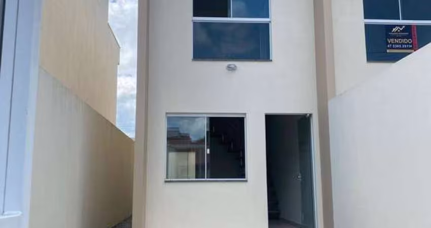 Sobrado geminado com espaço lateral, dois dormitórios, bairro Rio Pequeno.