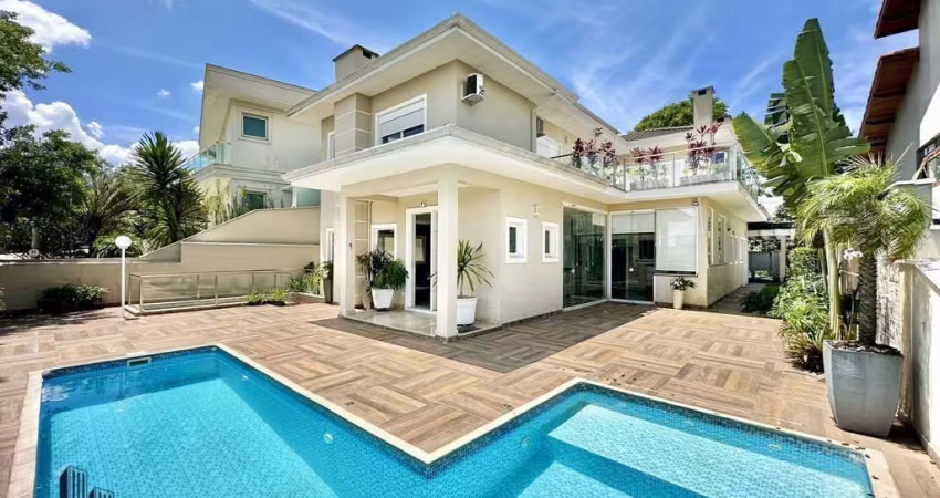 Condomínio Golf Village - Casa Alto Padrão para locação no Condomínio Golf Village - Impecável, 4 dorms / 2 suítes, varanda gourmet, piscina, 3 lareiras!