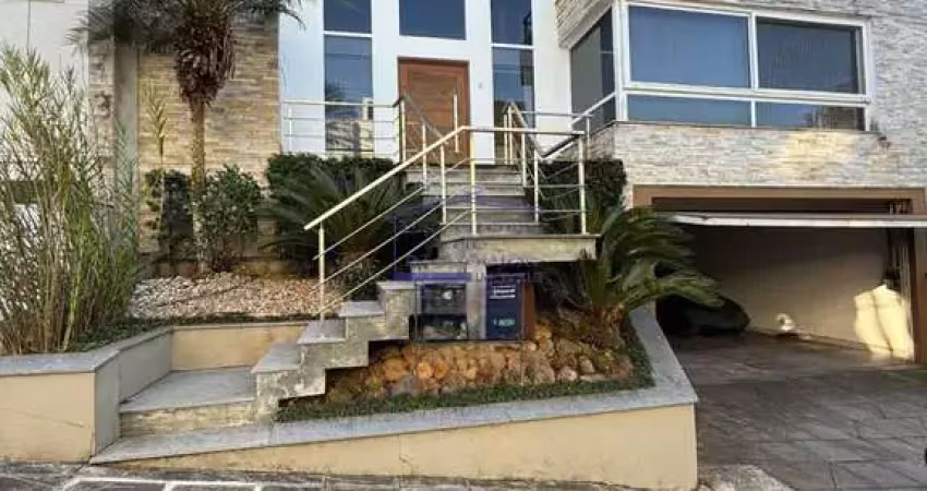 Imóvel de luxo em lomba do pinheiro: casa com 3 suítes, 3 salas e 6 vagas de garagem em porto alegre-rs