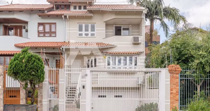 Casa com 3 quartos à venda na Rua Professor Isidoro La Porta, 112, Jardim Planalto, Porto Alegre