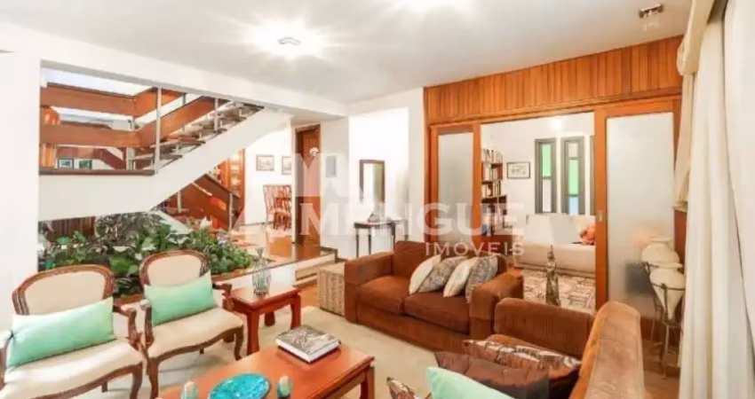 Casa com 3 quartos à venda na Rua Eudoro Berlink, 987, Auxiliadora, Porto Alegre