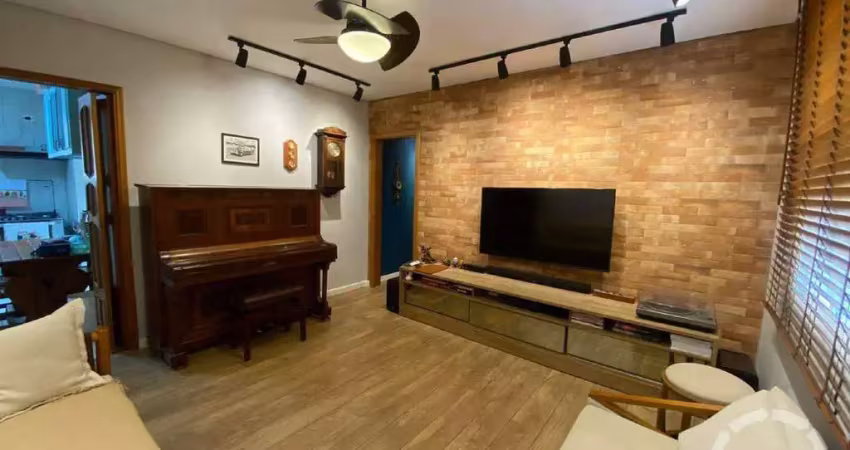 Amplo apartamento no embaré com 2 quartos sendo 1 suíte e closet com vaga fechada - oportunidade