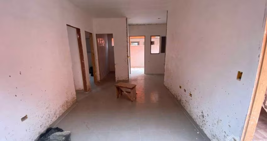 Village com 2 dormitórios à venda, 51 m² por R$ 350.000 - Indaiá - Bertioga/SP