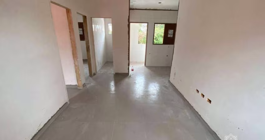 Village com 2 dormitórios à venda, 51 m² por R$ 330.000 - Indaiá - Bertioga/SP