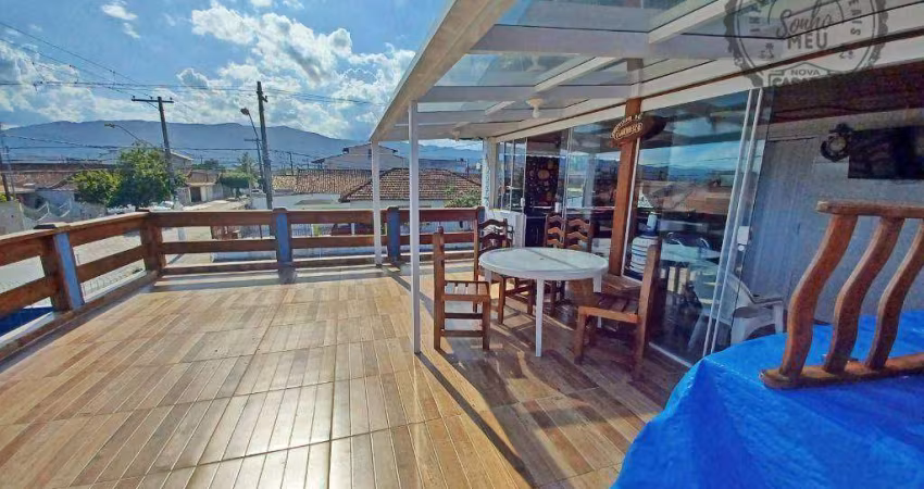 Sobrado com 3 dormitórios à venda, 142 m² por R$ 690.000,00 - Maracanã - Praia Grande/SP
