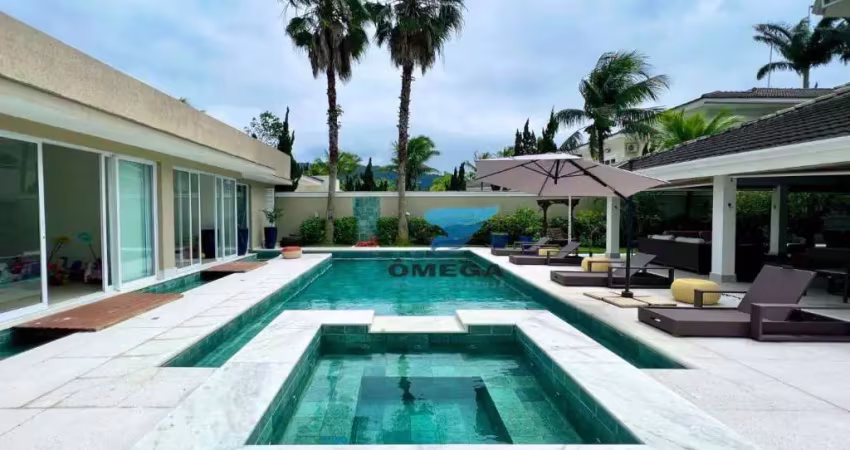 Casa à venda no condomínio jardim acapulco no guarujá | omega imóveis