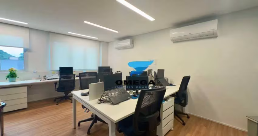 Sala comercial reformada à venda na praia das pitangueiras no guarujá i omega imoveis