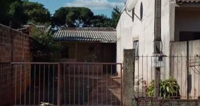TERRENO COM 2 CASAS , OTIMO INVESTIMENTO .