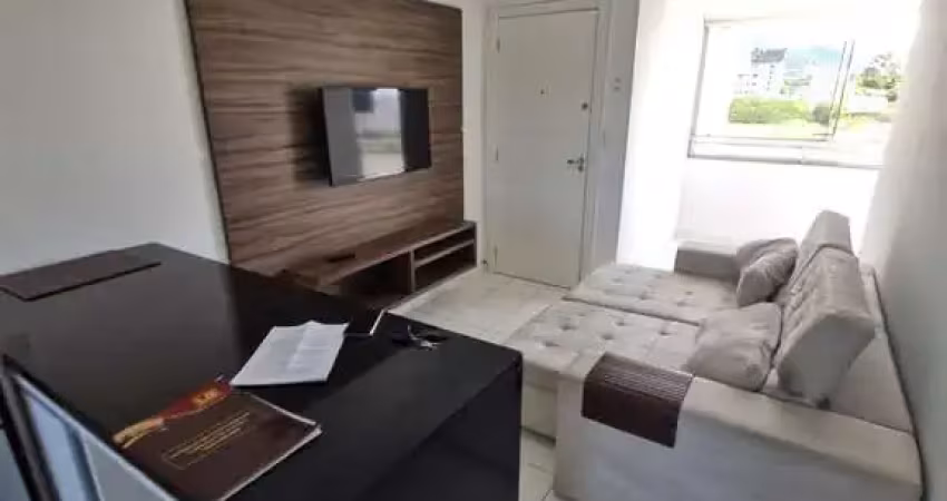 2 dormitorios 1 vaga e sacada com churrasqueira , semi mobiliado