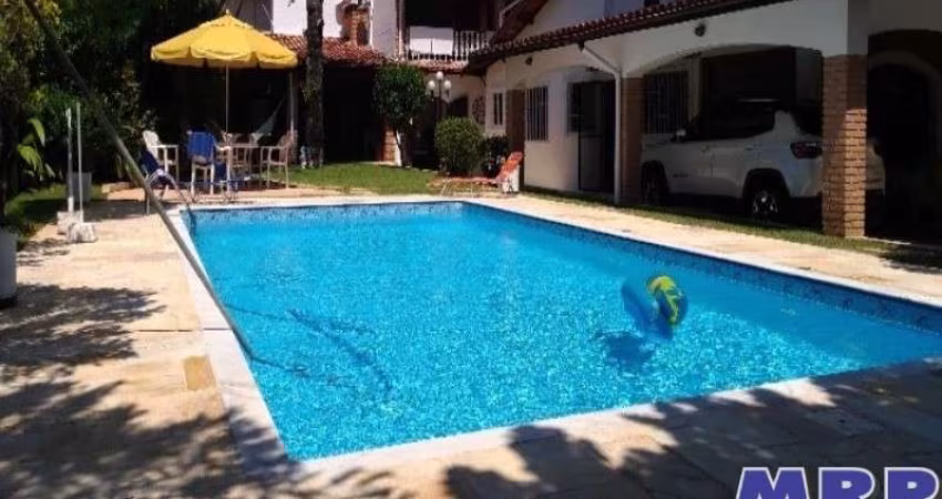 Casa à venda na Martim de Sá em Caraguatatuba, com 4 dormitórios.