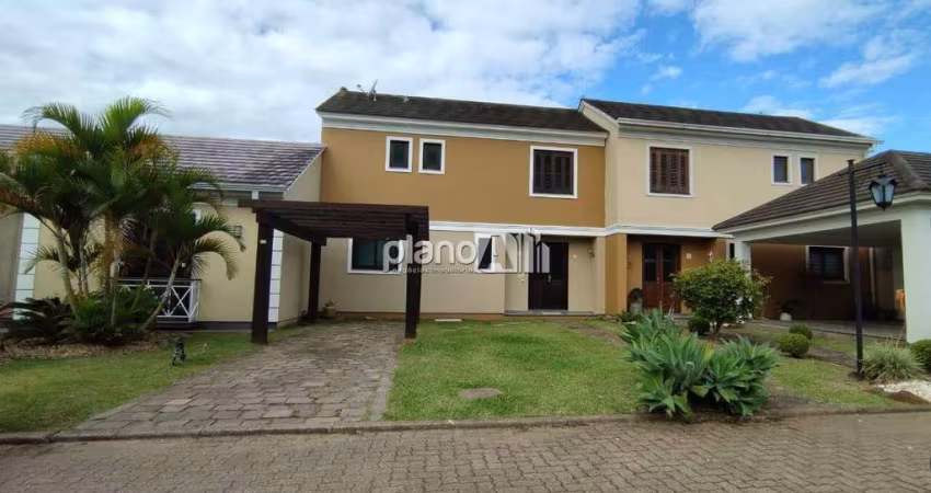 Casa em Condomínio Quintas do Ipê à venda, com 106,72m², 3 quartos 1 suíte - Santa Cruz - Gravataí / RS por R$ 750.000,00