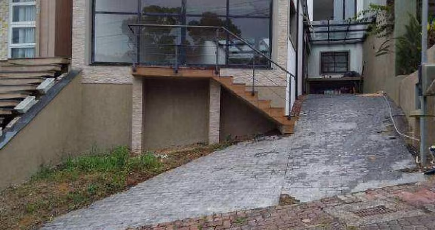 Casa com 3 dormitórios à venda, 232 m² por R$ 729.000,00 - Cavalhada - Porto Alegre/RS