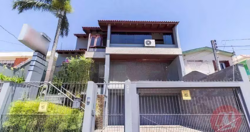 Casa com 5 dormitórios, 452 m² - venda por r$ 2.400.000,00 ou aluguel por r$ 10.679,00/mês - vila jardim - porto alegre/rs