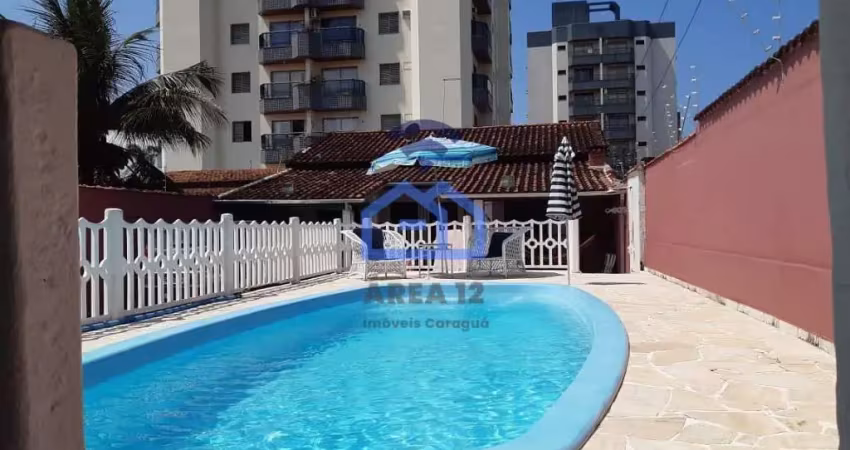 Casa à venda no bairro Martim de Sá - 3 dormitórios com ar condicionado, 3 banheiros, cozinha, área
