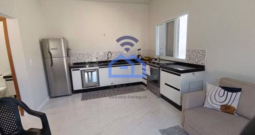 Área comercial com casa à venda no bairro Capricórnio II em Caraguatatuba, SP - terreno com 650m² m