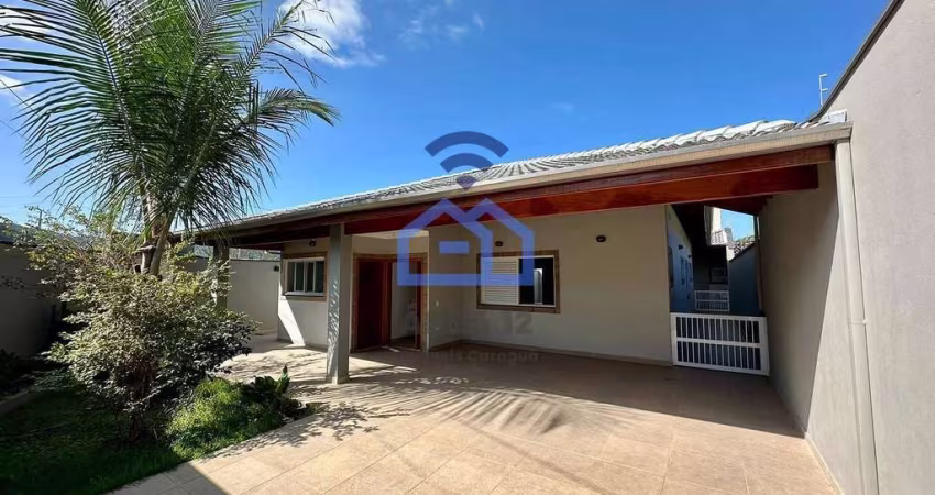 Casa espaçosa com excelente acabamento e 03 suítes à venda no bairro Cidade Jardim em Caraguatatuba
