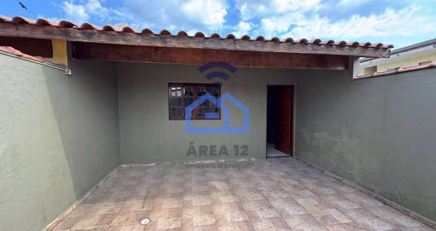 Casa à venda no bairro Jardim das Palmeiras em Caraguatatuba, SP - Venha conhecer seu novo lar!