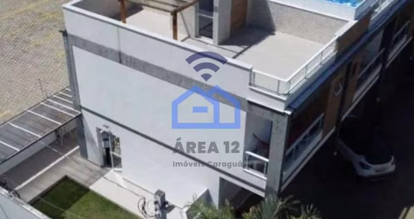 Sobrado triplex à venda no bairro do Massaguaçu em Caraguatatuba, SP - Localizado a apenas 150m da