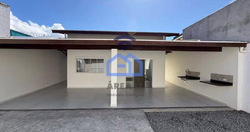 Casa à venda no bairro do Getuba em Caraguatatuba, SP - More com conforto e comodidade!