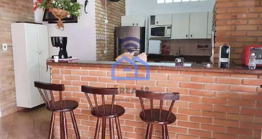 Sobrado com piscina e área gourmet à venda no bairro da Praia das Palmeiras em Caraguatatuba, SP