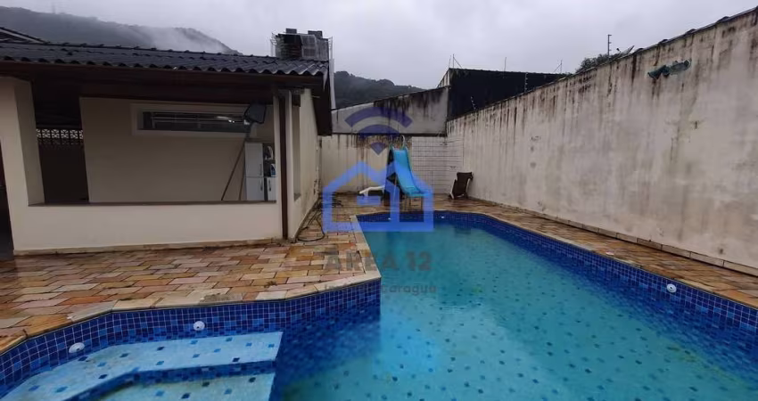 Casa de 3 suítes à venda no bairro do Sumaré em Caraguatatuba, SP - Com piscina e área gourmet!