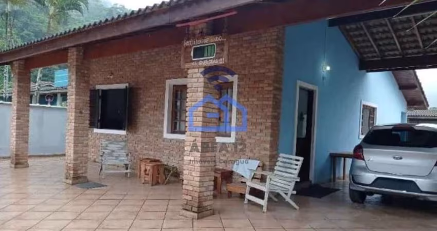 Casa com piscina à venda no Condomínio Recanto Verde Mar, na Cocanha em Caraguatatuba, SP