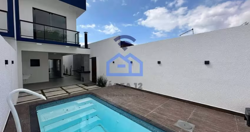 Casa à venda com piscina, espaço gourmet e 3 dormitórios, jardim porto novo, caraguatatuba, sp