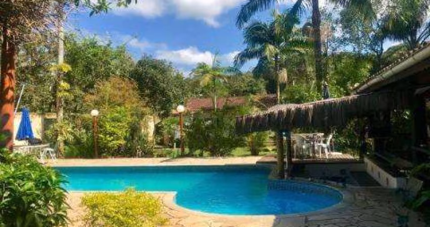 VENDA DE CHÁCARA NO JARDIM SÃO FERNANDO, EM ITANHAÉM/SP, 2 terrenos com casa principal de 4 suítes, casa do caseiro, piscina e canil. CONSULTE-NOS.