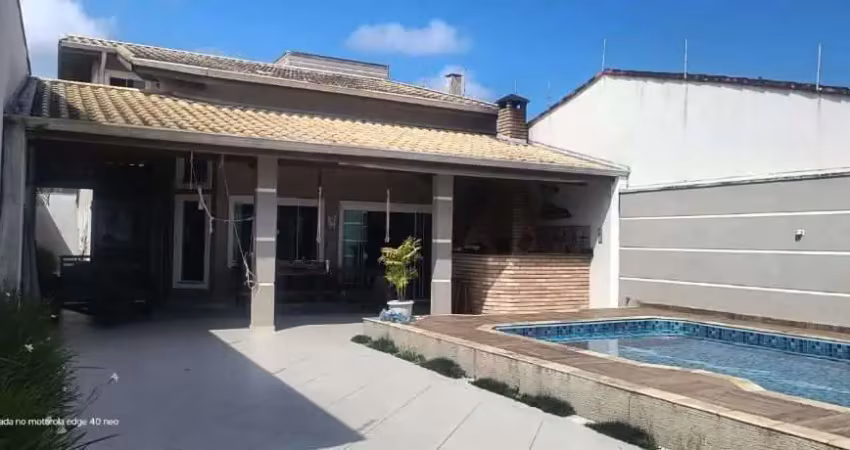 Casa com 3 dormitórios à venda, 190 m² por R$ 890.000 - Jardim Regina - Itanhaém/SP