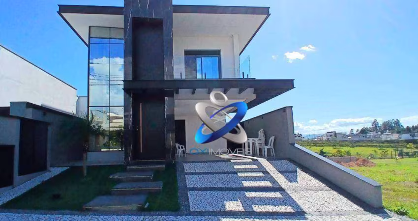 Sobrado com 3 dormitórios à venda, 285 m² por R$ 1.850.000 - Condomínio Malibu - Caçapava/SP